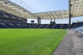 Blue Seatings, Green Pitch, Gallery and Glass Benches inside Emp Royalty Free Stock Photo