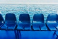 Blue seats on a ferry Royalty Free Stock Photo
