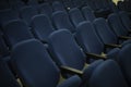 Blue seats in hall. Rows of seats. Cinema Details