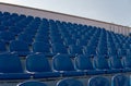 Bleachers in a sports stadium. Blue Seats In A Row Royalty Free Stock Photo