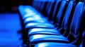 Blue Seats in a Row Royalty Free Stock Photo