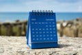 Blue September 2022 calendar on blurred background of blue ocean