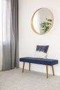 Blue settee with pillow in elegant waiting room Royalty Free Stock Photo