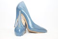 Blue sexy high-heeled shoes isolated on a white carpet. Royalty Free Stock Photo