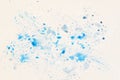 Blue shades of watercolor is spilled on white paper. Canvas background for design, hand draw Royalty Free Stock Photo