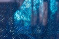 Blue shattered glass completely covered with cracks, creating a fragmented, textured surface with sharp patterns and a dramatic Royalty Free Stock Photo