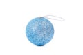 Blue shiny Christmas ball, white background. Royalty Free Stock Photo