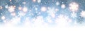 Blue shiny winter banner with snowflakes.