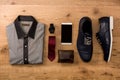 Blue shoes, mobile phone, tie, notecase, clock and shirt