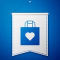 Blue Shopping bag with heart icon isolated on blue background. Shopping bag shop love like heart icon. Happy Valentines
