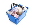 Blue shopping basket with  gifts on white background Royalty Free Stock Photo