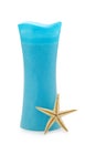 Blue shower gel in bottle with sea star