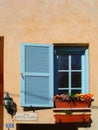 Blue shutter and flowers in Neve Tzedek