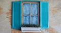 Blue shutters and faux windows Royalty Free Stock Photo
