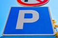 Blue sign for free parking with sky background Royalty Free Stock Photo