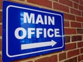 Blue sign says main office