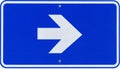 Blue Sign with White Arrow Pointing Right Royalty Free Stock Photo