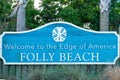 Blue signpost "Welcome sign for Folly Beach, SC which is just south of Charleston South Carolina USA Royalty Free Stock Photo