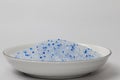 Blue Silica Gel Desiccant on white background. Royalty Free Stock Photo