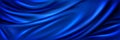 Blue silk fabric background, satin cloth texture Royalty Free Stock Photo