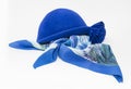 Blue silk scarf and small felt hat Royalty Free Stock Photo