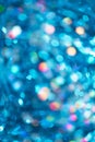 Blue and silver abstract bokeh lights. Defocused background. Copy space. Festive texture Royalty Free Stock Photo