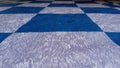Blue and silver checkered flooring with an abstract pattern Royalty Free Stock Photo