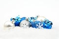 Blue,silver christmas decoration on snow Royalty Free Stock Photo