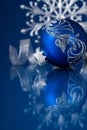 Blue and silver christmas ornaments on dark blue background Royalty Free Stock Photo