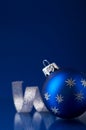 Blue and silver christmas ornaments on dark blue xmas background Royalty Free Stock Photo