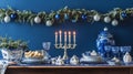 Blue and Silver Festive Table Setting with Candles and Garland Royalty Free Stock Photo