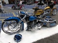 Blue and Silver Motorcycle at the Auto Show