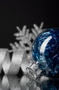 Blue and silver xmas ornaments on black background Royalty Free Stock Photo