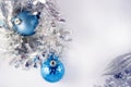 Blue and silver xmas ornaments on bright holiday background with space for text. Merry christmas Royalty Free Stock Photo