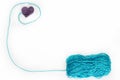 Blue skein with crochet heart Royalty Free Stock Photo
