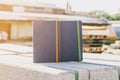 A blue sketchbooks on industrial background Royalty Free Stock Photo