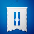 Blue Ski and sticks icon isolated on blue background. Extreme sport. Skiing equipment. Winter sports icon. White pennant