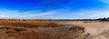 Blue skies over Corporation Beach in Dennis, Massachusetts on Cape Cod Royalty Free Stock Photo