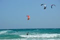 Colorful kites on emerald water of Atlantic Ocean
