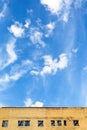 Blue sky above furbished building