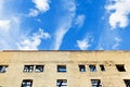 Blue sky above furbished house