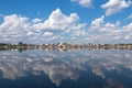 Blue sky above lake reflected in the water