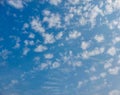 Blue sky background with cumulus white clouds, nature photography, sun rays, natural background, cloud wallpaper Royalty Free Stock Photo