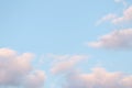 Blue sky background with pale pink clouds at sunset Royalty Free Stock Photo
