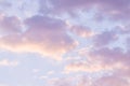 Blue sky background with pale pink clouds at sunset Royalty Free Stock Photo