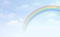 Blue sky background with rainbow and white dove