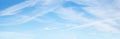 Blue sky background with stripes of cirrus clouds, panorama Royalty Free Stock Photo