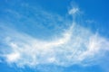 Beautiful and unusual nature, bright light blue sky with small white clouds. Royalty Free Stock Photo