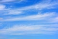 Beautiful and unusual nature, bright light blue sky with small white clouds. Royalty Free Stock Photo