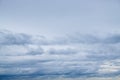 Blue sky background with tiny fluffy clouds. With copy space Royalty Free Stock Photo